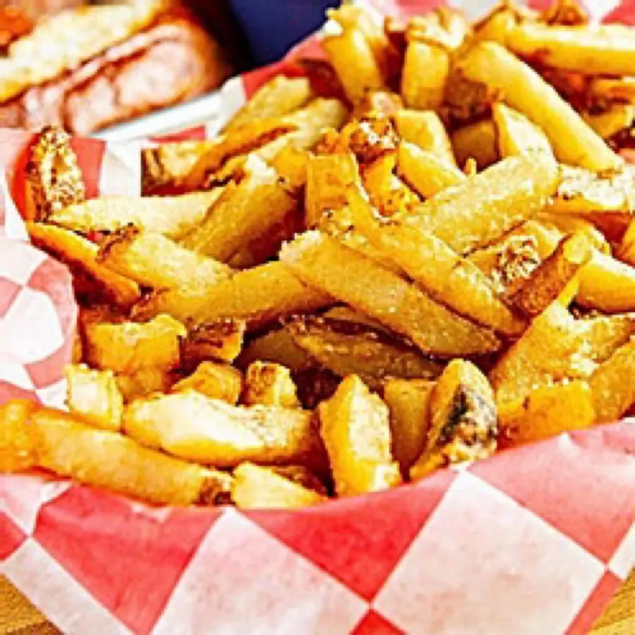 A basket of seasoned fresh-cut fries